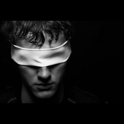 Premium AI Image  Blindfolded man in dramatic lights